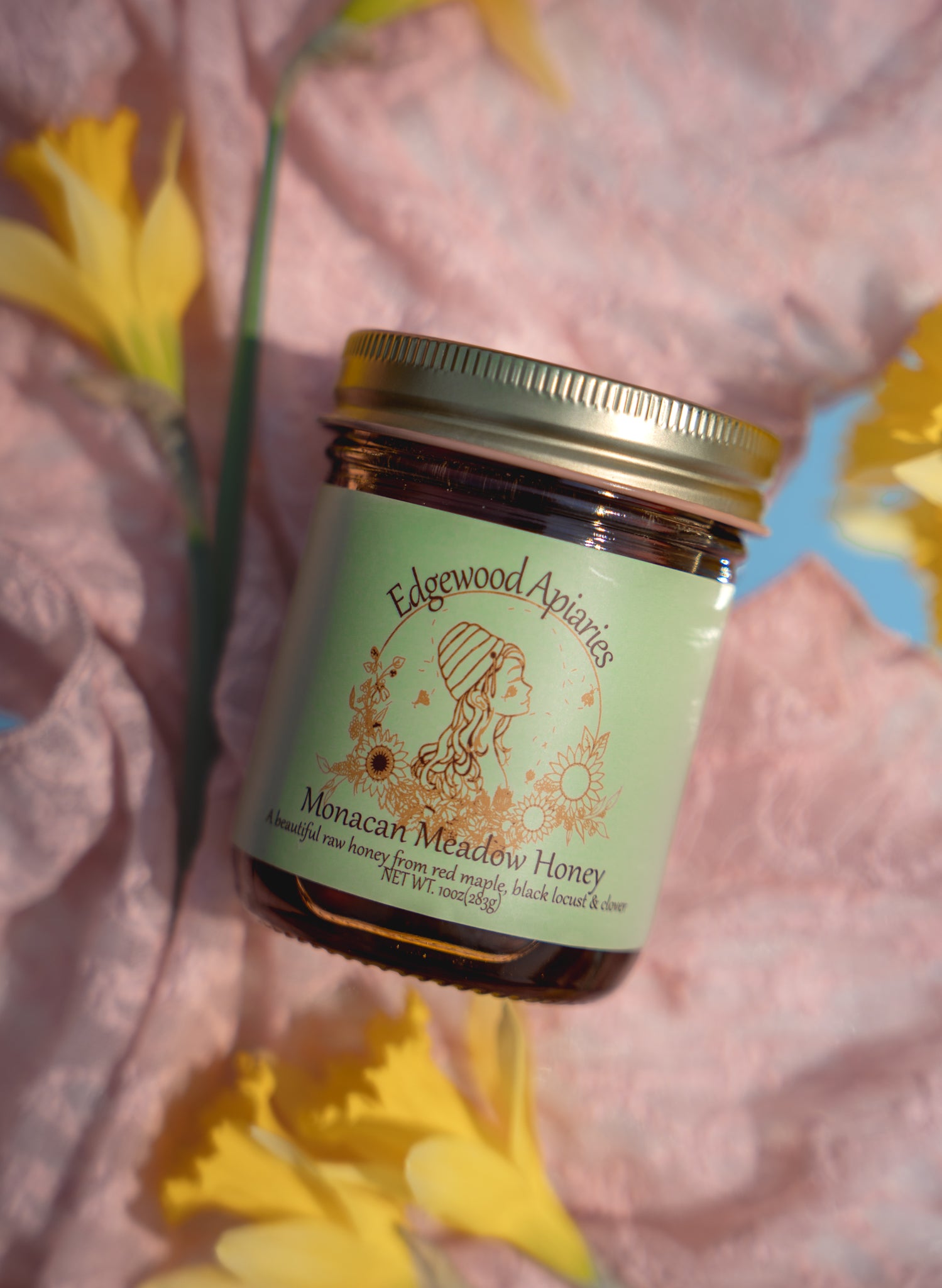 Edgewood Apiaries Monacan Meadow Honey on a Virginia daffodil backdrop