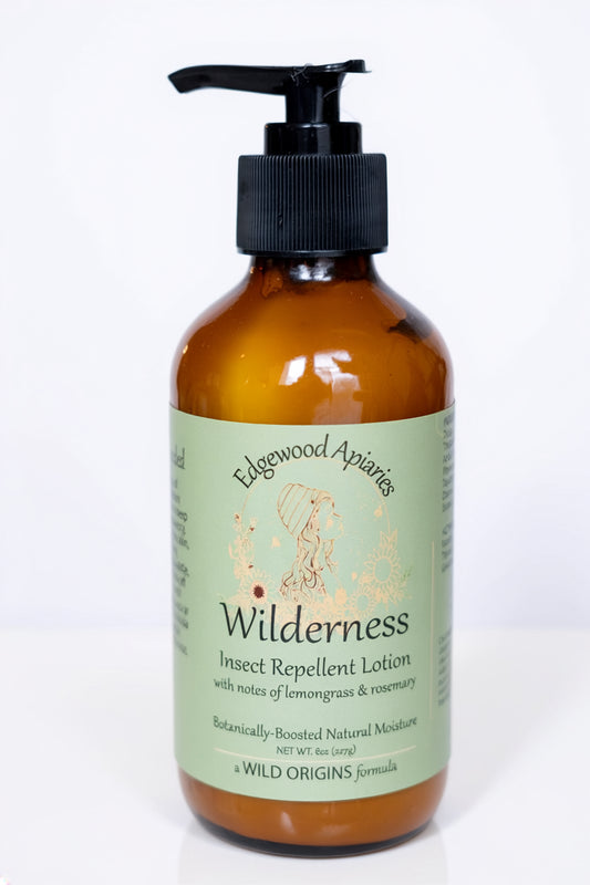 Edgewood Apiaries Wilderness Insect Repellent Body Lotion in a glass pump bottle on a white background