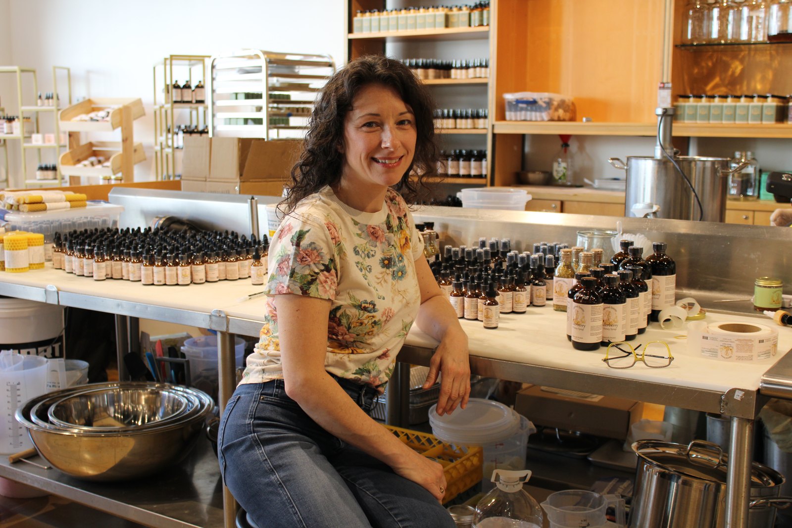 Amanda Sweeney in Edgewood’s retail and production space at Stony Point. Photograph by Jackie DiBartolomeo for Richmond BizSense.