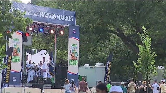 Stage and crowd at the Great American Farmers Market on the National Mall.
